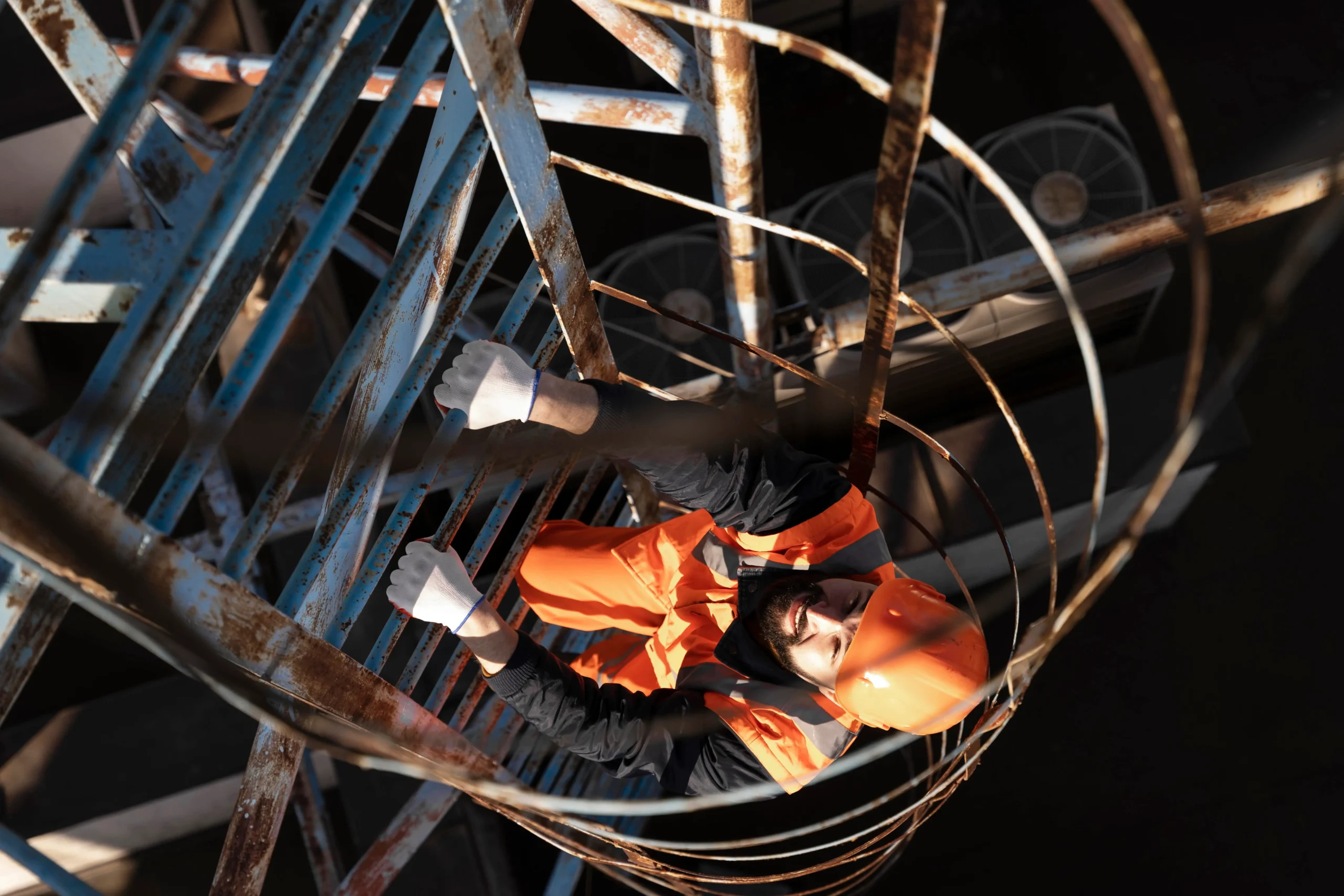 Image of man entering a confined space for Confined space entry safety training